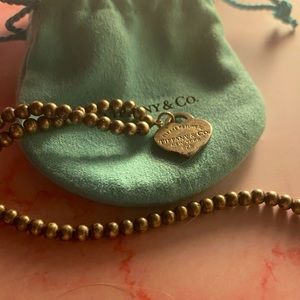 Tiffany’s og necklace. Return to Tiffany’s. 10 years old. Great condition.